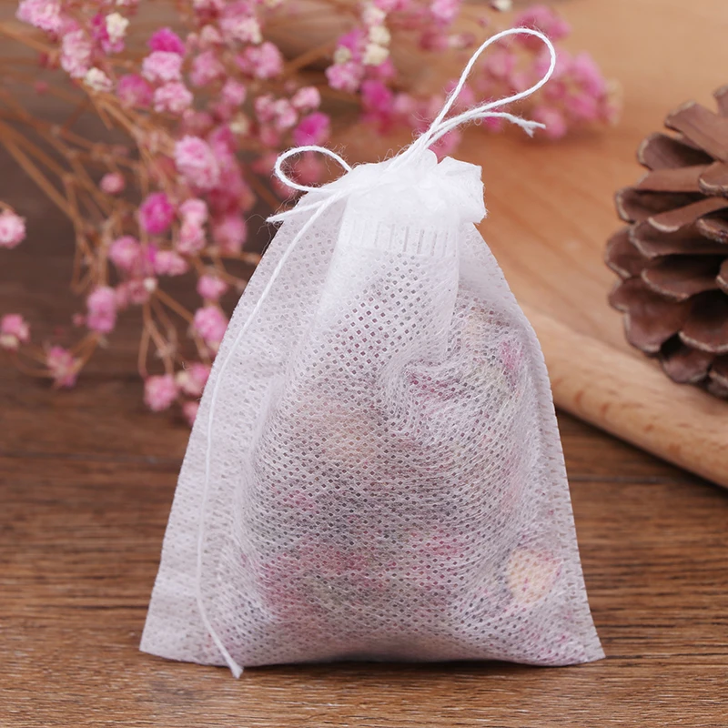 

Tea Bags 100Pcs/Lot Empty Scented Drawstring Pouch Bag 7*9CM Seal Filter Cook Herb Spice Loose Coffee Pouches Tools