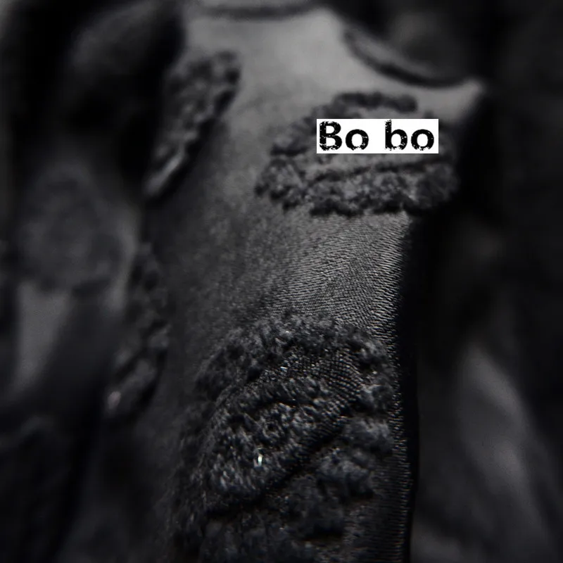 

Black jacquard designer garment fabric