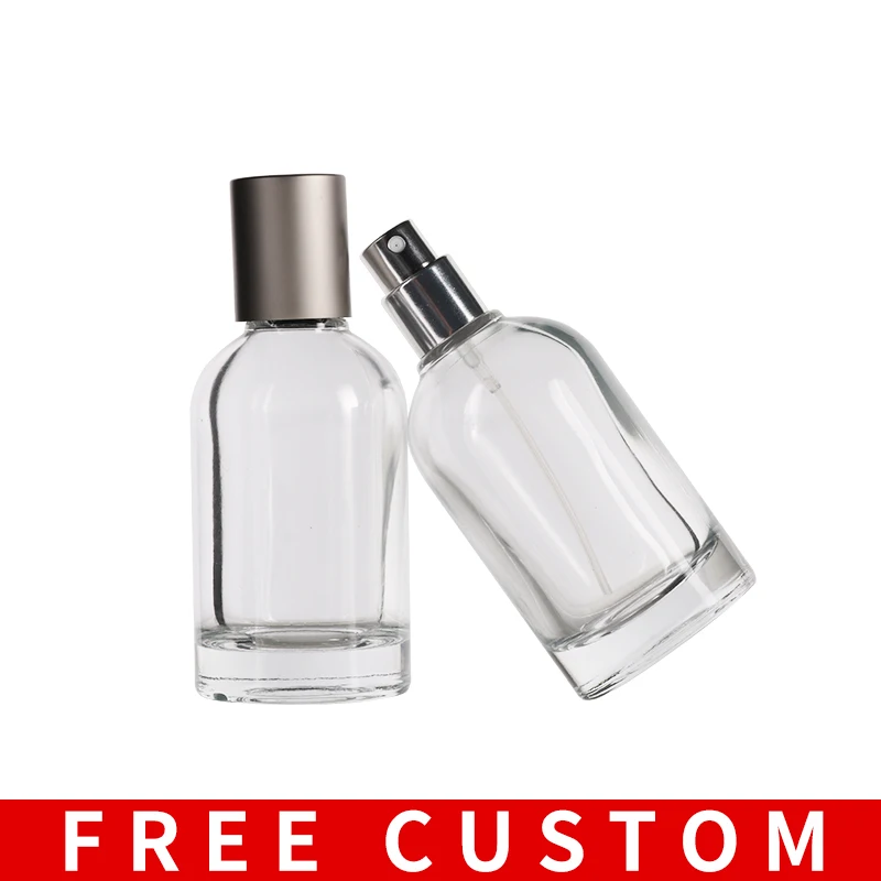 

Free Custom Logo 50ml Portable Clear Cylinder Travel Atomizer Spray Glass Empty Bottle for Cosmetic Press Container Packaging