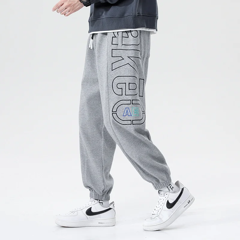 

2021 повседневные спортивные мужские брюки до щиколотки Осенняя трендовая свободная Корейская версия универсальные брюки-карго трендовые м...