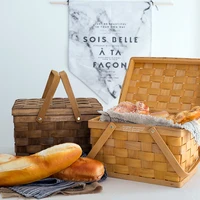 woven picnic basket with lid cover handmade bakery bread hiking storage box cake table decorating food photography wedding deco