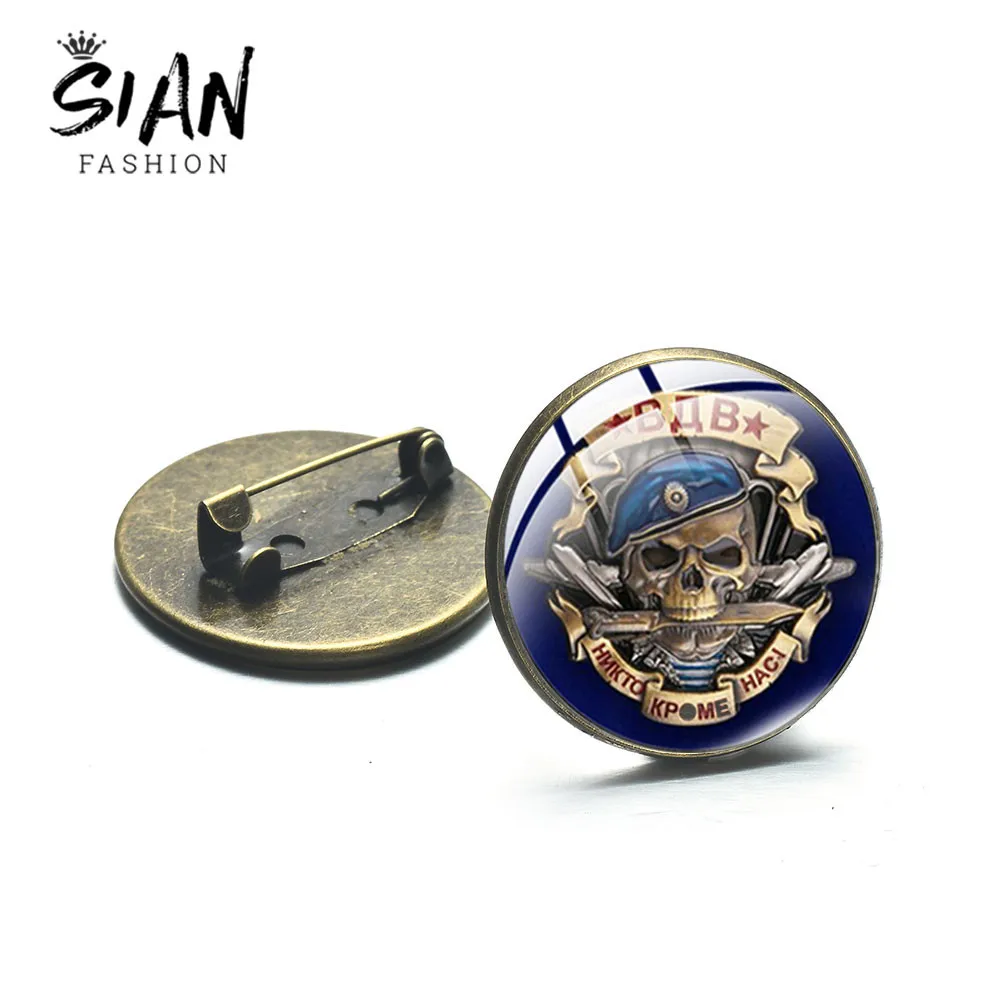 Брошь на булавке со стеклянным кабошоном в виде кабошона военно-воздушные силы