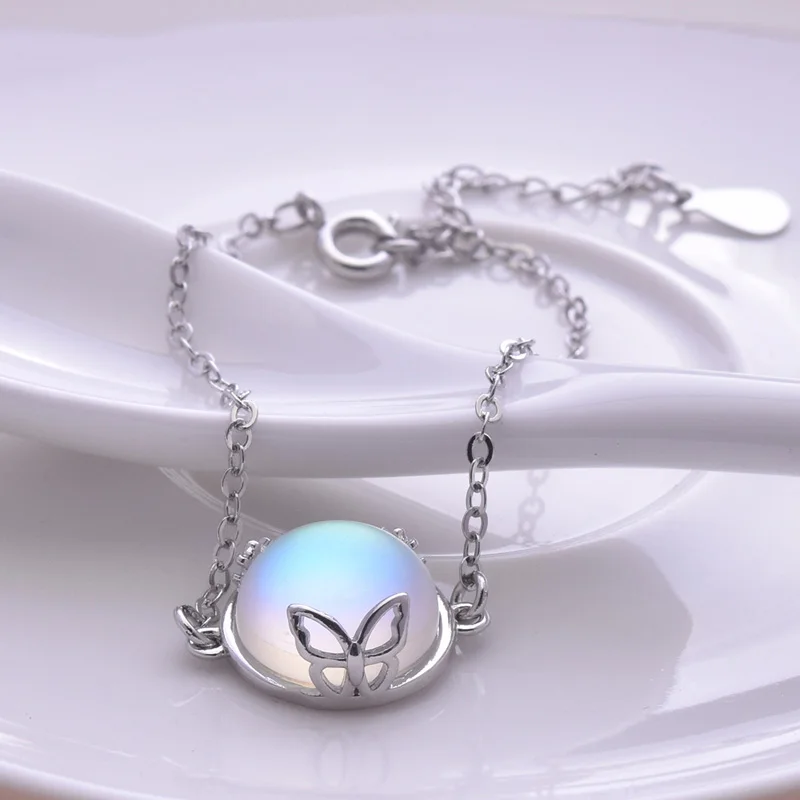 

Браслет женский серебристый с круглыми бабочками и кристаллами