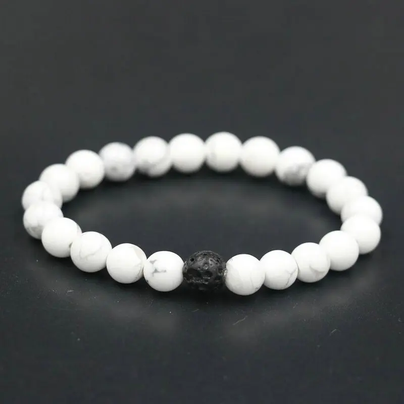 Браслет с натуральными камнями черно белыми бусинами|Плетеные браслеты| |