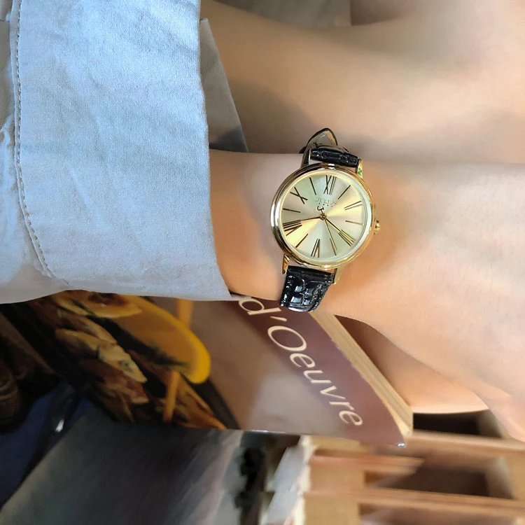 

GOLDEN ROUND DIAL GENUINE LEATHER WATCHBAND FEMALE WATCH SIMPLE LITERARY STYLE QUARTZ WATCH