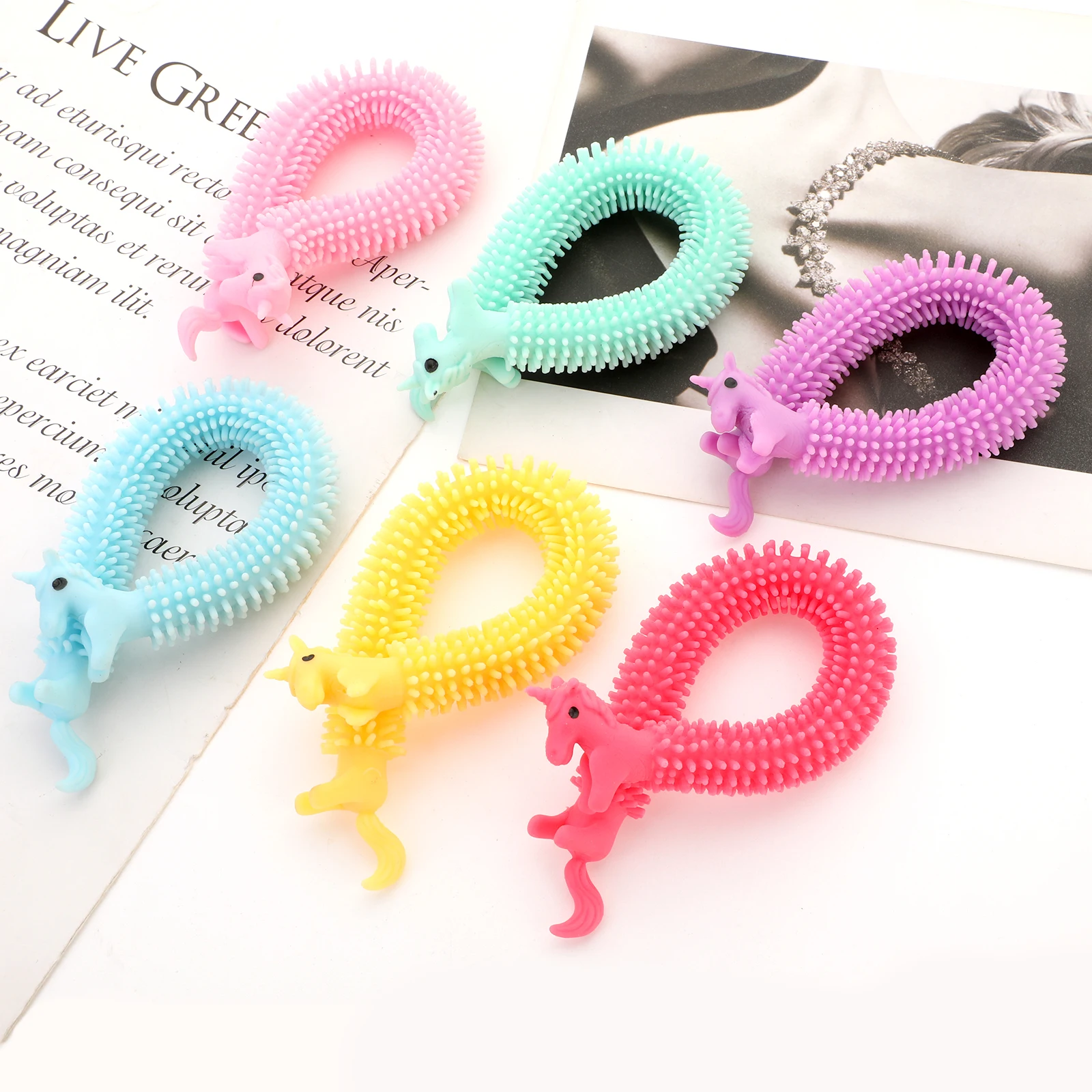 

Stretchy String Fidget Sensory Toys for Kids Boys Girls Toddlers with Autism Stress Relief Party Favors