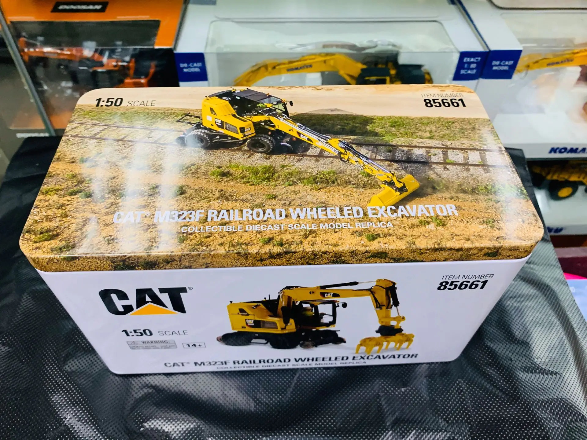 Железная дорога Caterpillar Cat M323F колесный экскаватор 1/50 бренд DieCast Masters DM85661 |