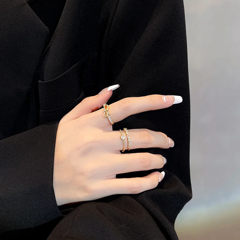 

Korean Version Of The Two-piece Suit Bow Ring Female Inlaid Zircon Light Luxury High Sense Ring Open Index Finger Ring Tide