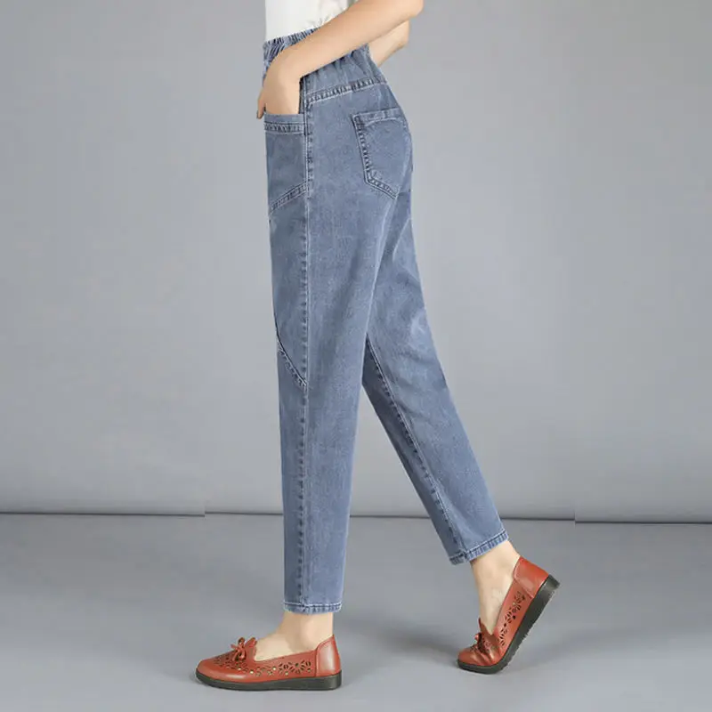 

Fashion mom jeans women's autumn thin Harlan radish pants high waist slim middle aged casual women's Capris