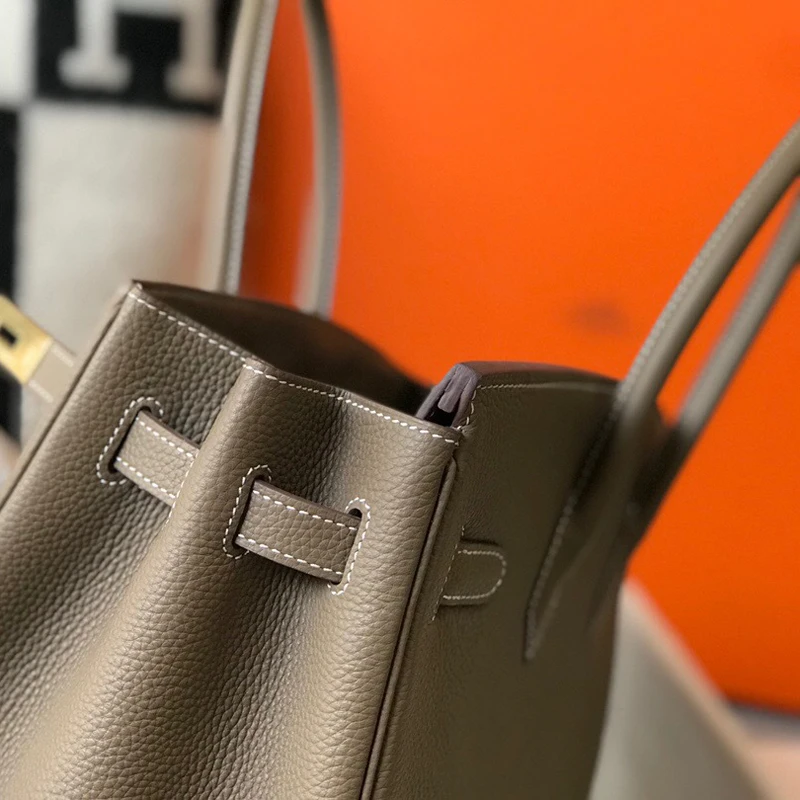 

2021 New Style Lychee Pattern Leather Platinum Top Layer Cowhide Lock Fashion Handbag Big Bag