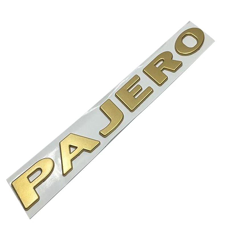 Золотой серебряный логотип PAJERO с надписью табличка названием Стайлинг