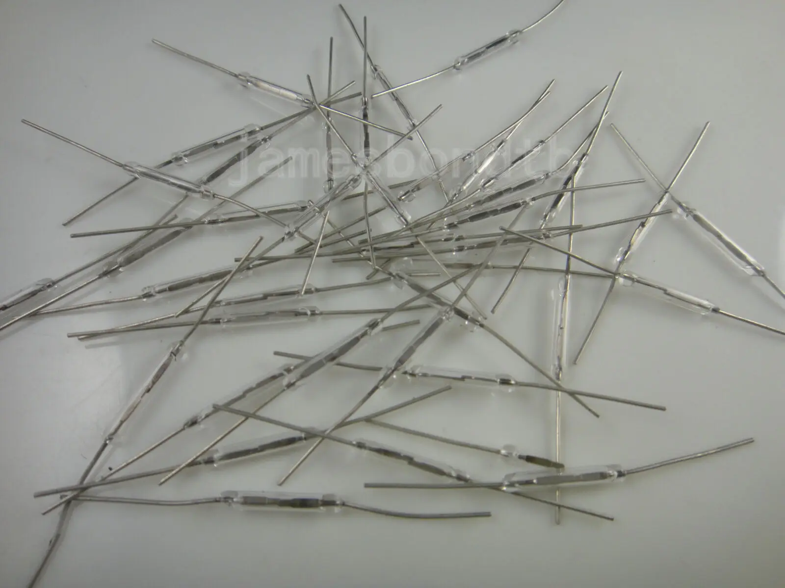 

100pcs/LOT Reed Switch 2X14mm GLASS White Color N/O Low Voltage Current