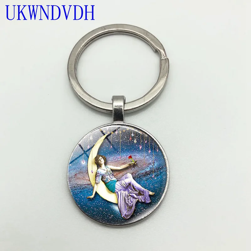 

Hot sale man and moon round keychain fashion creative key ring pendant
