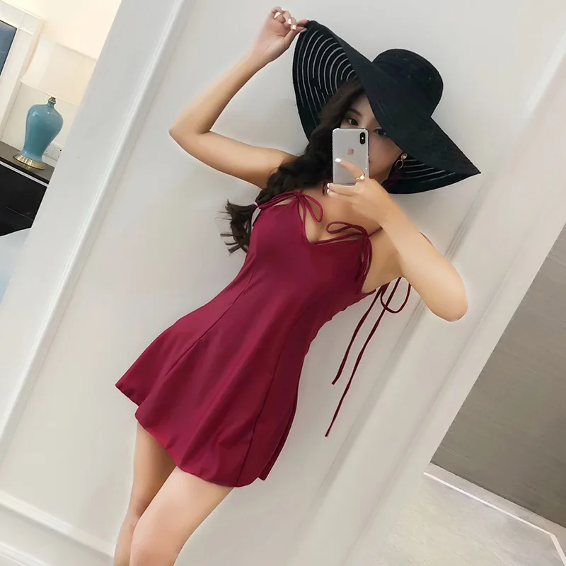 

Новый однотонный Простой корейский Цельный купальник с юбкой, женское ощущение открытой спины и талии, закрывающийся для демонстрации, Тон...