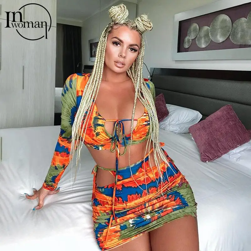 

Женский костюм-двойка с юбкой, V-образным вырезом и длинным рукавом