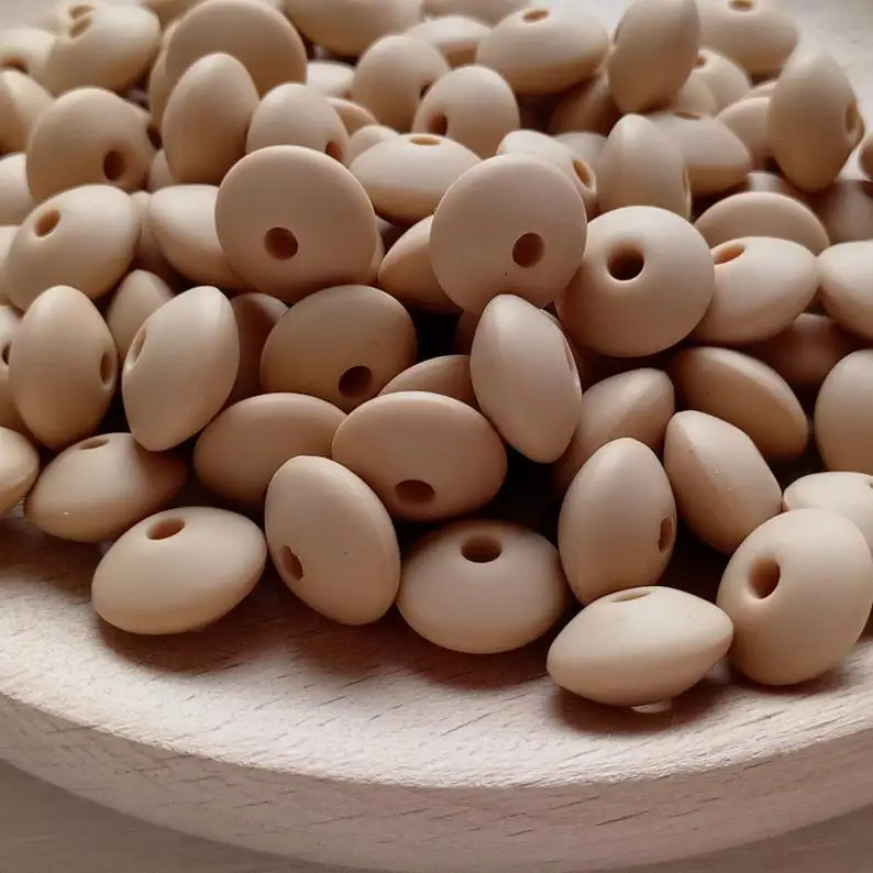 

Oatmeal Saucer Silicone Beads Wholesale 12mm BPA Free Silicone Teethers Baby silicone teething beads BX11