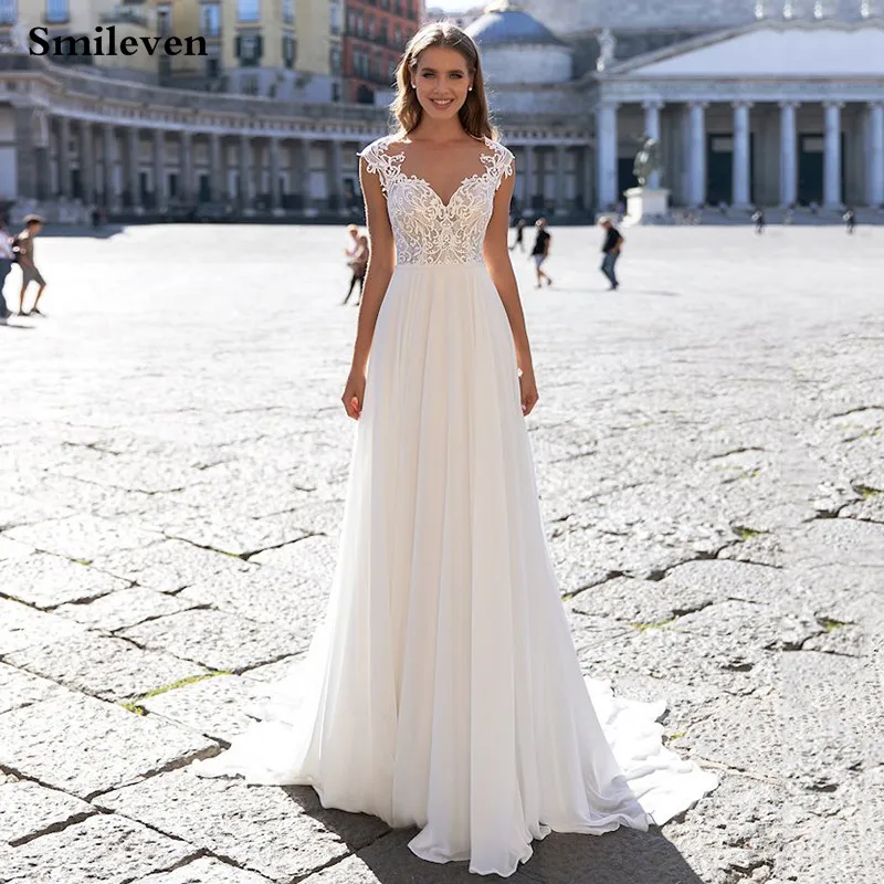 Smileven Новый Винтаж кружевное свадебное платье 2021Cap рукавом шифоновое платье трапециевидной формы, платья невесты костюм с сексуальным вырезом и открытой спиной, сексуальное размера плюс 2021 свадебное платье Smileven Новый Винтаж кружевное свадебное платье 2021Cap рукавом шифоновое платье трапециевидной формы, платья невесты костюм с сексуальным вырезом и открытой спиной, сексуальное размера плюс 2021 свадебное платье