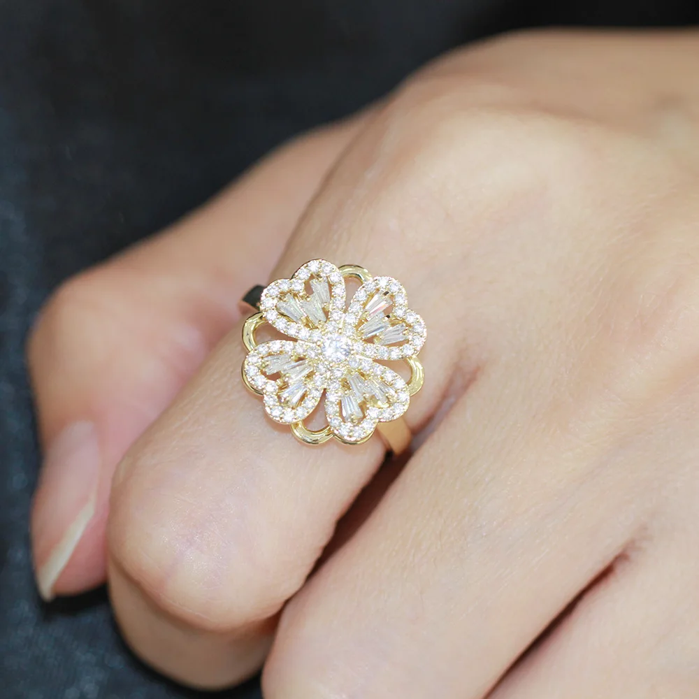 

Korean version of the new four-leaf clover rotating full diamond flower ring female personality exquisite opening flower ring