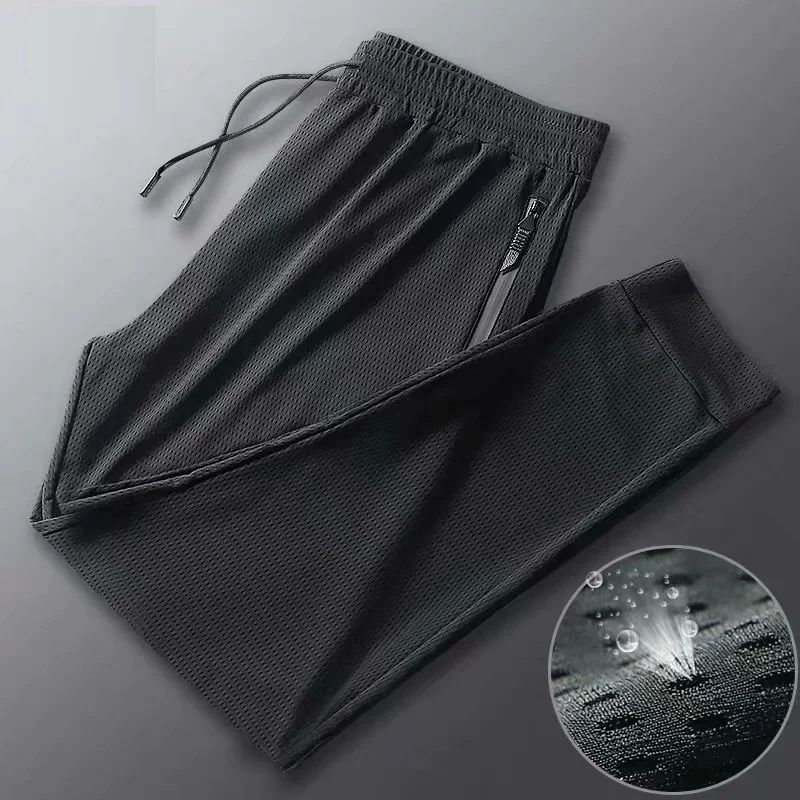 

Summer Thin Ice Silk Pants Men's Casual Trousers Loose Sports Pants Feet Elastic Nine-point Trousers Tied Feet Sweatpants Women