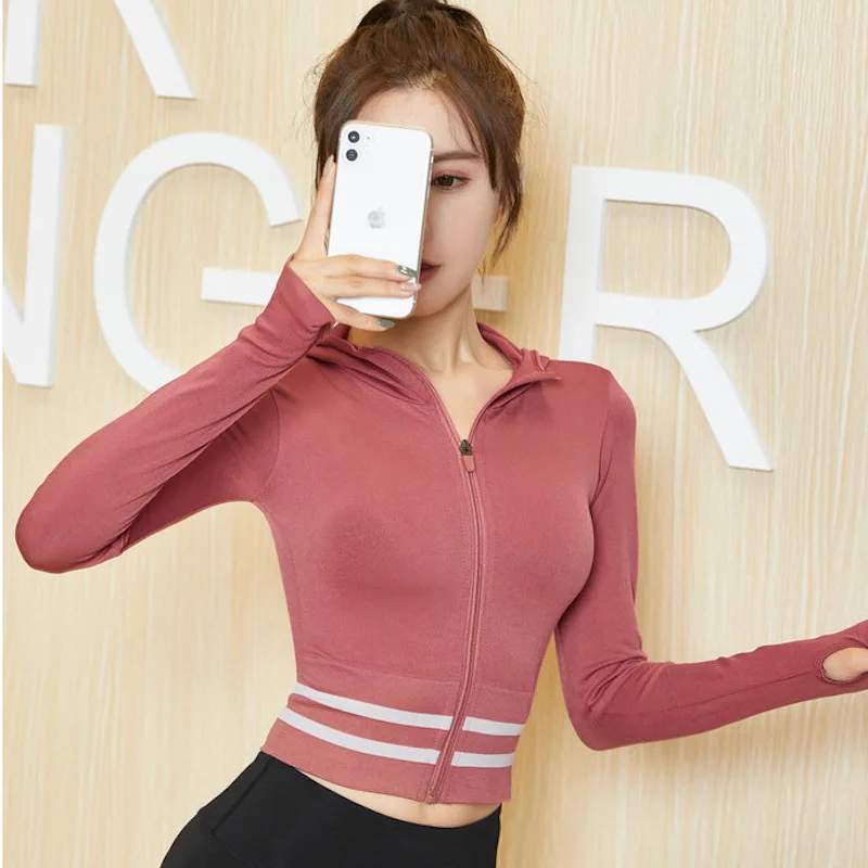 

Осенняя спортивная куртка для женщин, для бега, с отверстиями для большого пальца, для йоги, укороченный топ на молнии, толстовка с капюшоном...