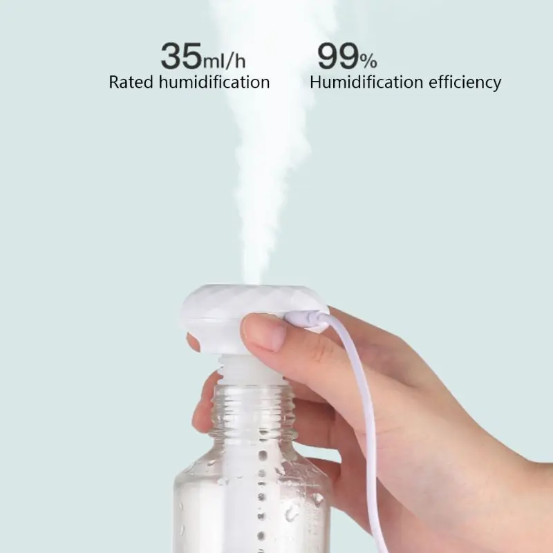 

Mini Portable Spray Humidifier Atomizer Alcohol Dispensor Touchless Sanitizer