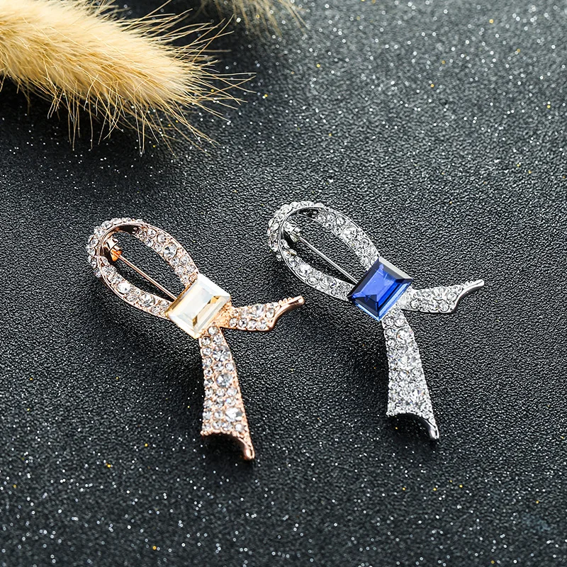 

Elegant Quality Golden Bowknot Brooch Dark Blue/Champagne Crystal Pins Date Wedding Annual Jewelry Brand Dress Coat Accessories