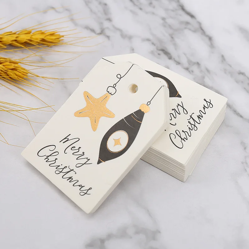 

50pcs Merry Christmas Gift Decoration Tags Bronzing Christmas Tree Star Tags Label Biscuit Candy Bag Party Supplies 6.8*4.5cm