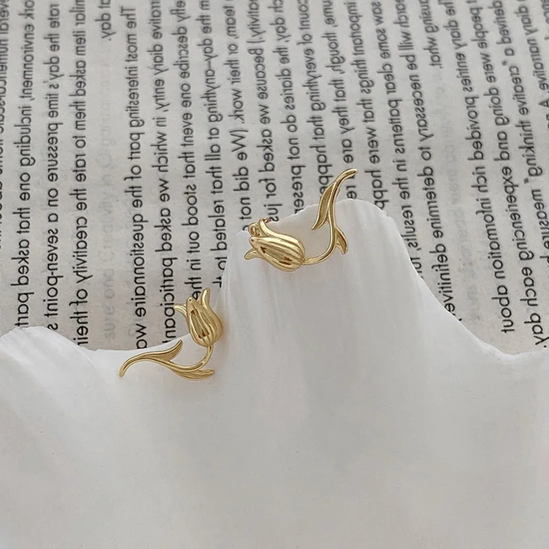 

Minar Elegant Metallic Gold Color Tulip Earrings for Women Twist Asymmetric Shiny Rhinestone Flower Dangle Earrings Oorbellen