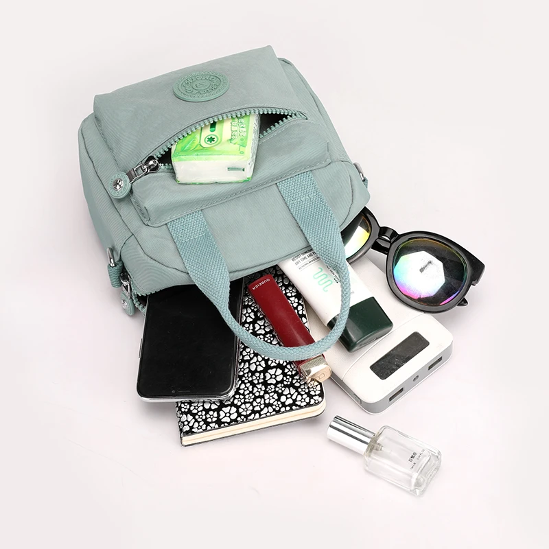 

2021 New Women Messenger Bags Phone Bag Money Pocket Nylon Inclined Shoulder Bag Women Crossbody Handbags Bag Ball Tassel Bolsa