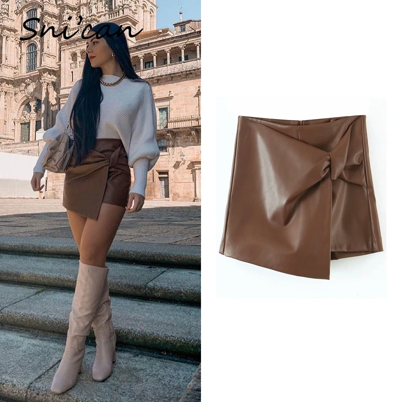 

Snican Brown Faux Leather Skirt High Waist Bow Asymmetrical Sexy Mini Faldas Cortas Za 2021 Women Jupe Cuir Femme Summer Spring