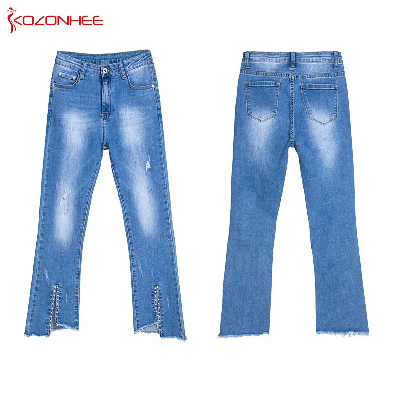 Модные вышитые расклешенные джинсы женские потертые Стрейчевые нестандартные