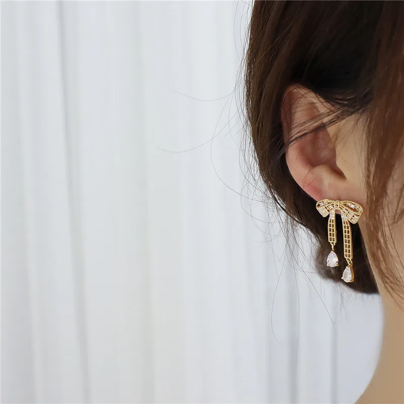 

Exquisite tassel Bling zircon temperament 14 gold ear bone clip woman pearl crystal Korean earrings new jewelry pendant accessor