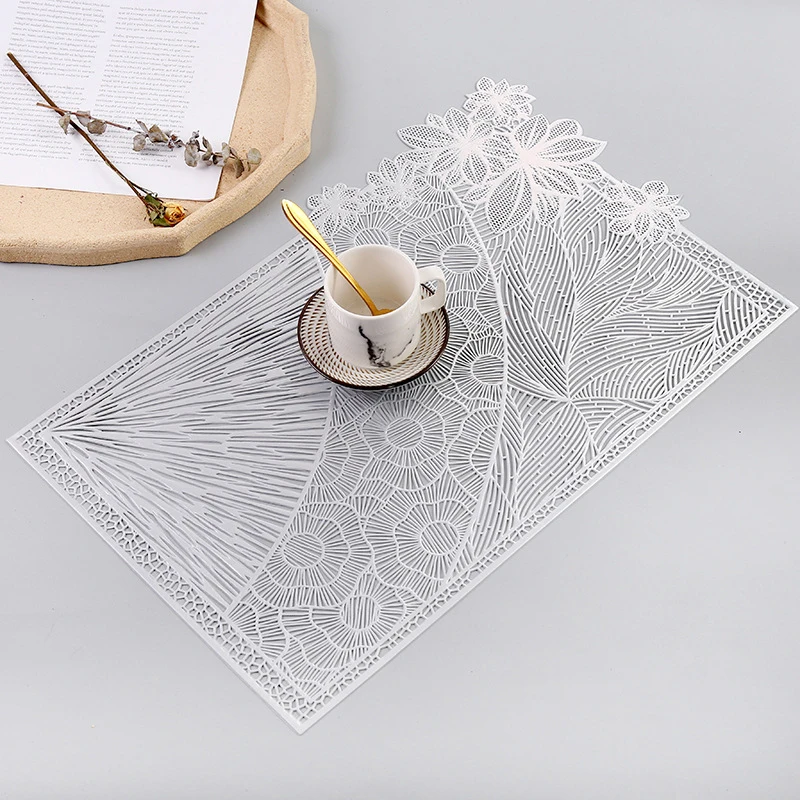 

2021 New Rectangular Western Placemats Geometric Hollow Placemats Non-slip Placemats Embroidered Simple Heat Insulation Placemat