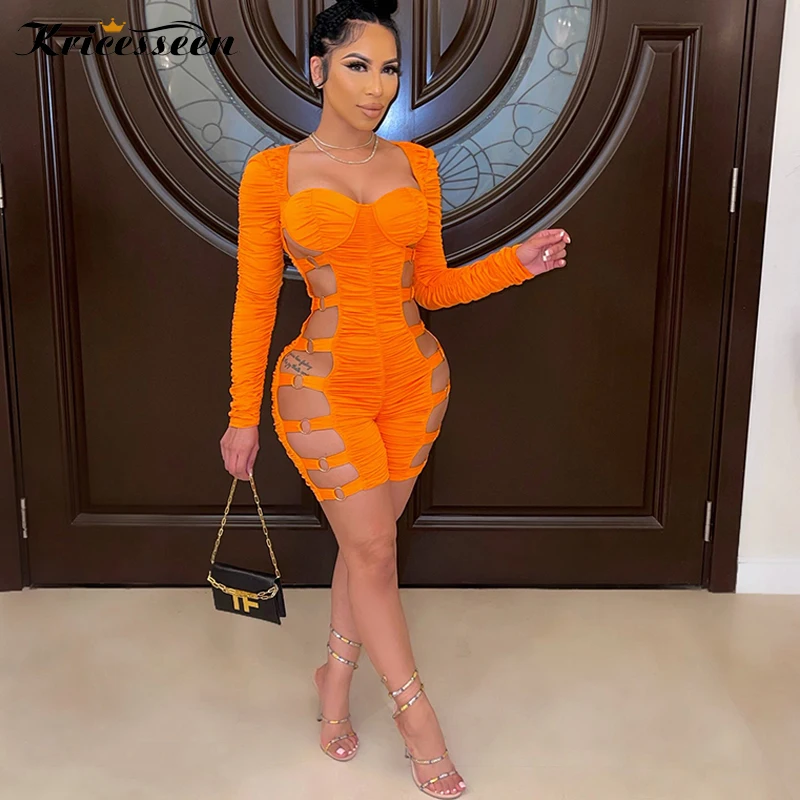 

Kricesseen Sexy Orange Buckles Details Folds Skinny Short Jumpsuit 2021 Women Long Sleeve Hollow Out Playsuit Clubwear Rompers