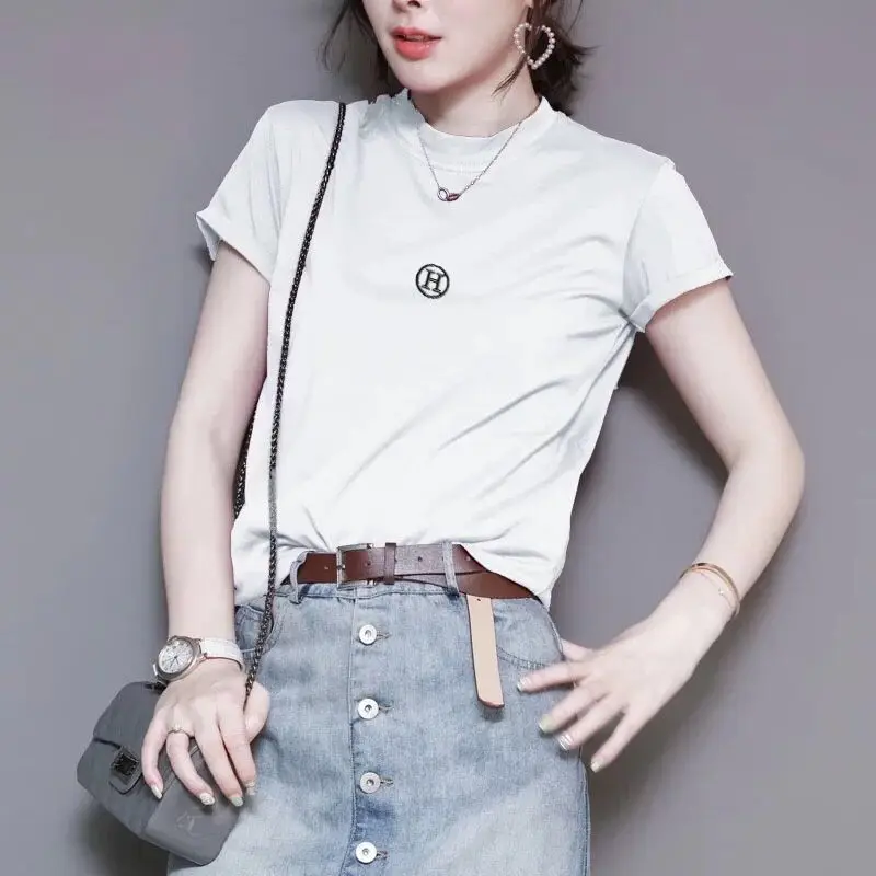 

T-shirt female 2021 summer new Korean letter embroidered short sleeve T-shirt solid color simple Joker jacket