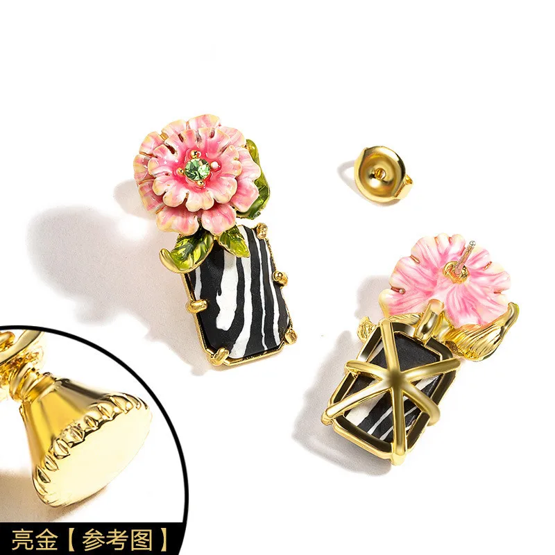 

The new pink enamel flowers gem earrings female temperament no pierced ear clip spiral