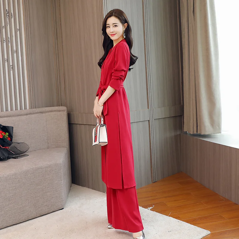 Элегантный женский комбинезон с поясом и широкими штанинами офисный вечерний