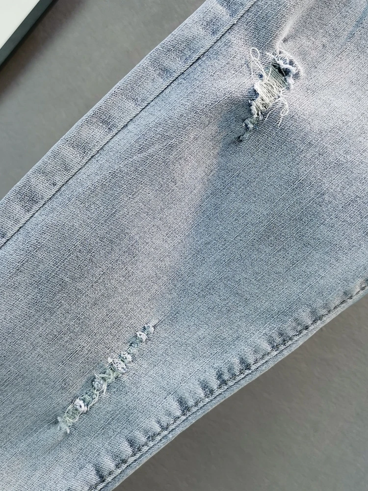 Джинсы женские облегающие синие тонкие эластичные с кисточками обтягивающие