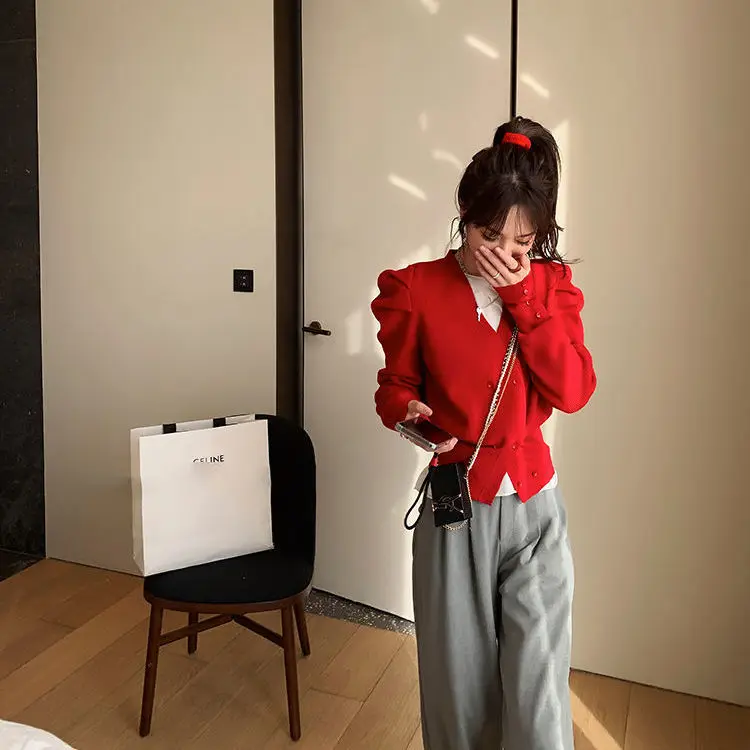 

2021 spring new women's short double breasted knitted cardigan women's bubble sleeve V-neck design sweater coat