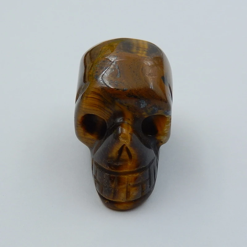 

Natural Stone Handcarved Skull Tiger'Eye Cabochon 35x20x25mm 29.4g fashion jewelry birthday Gift for man accessory