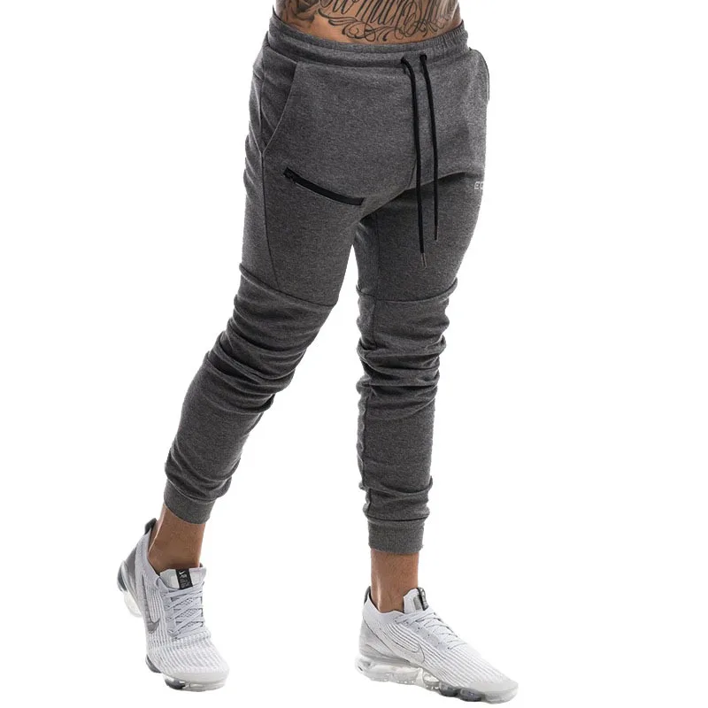

2020 New Muscle Fitness Sports Trousers Men's Casual Small Feet Tights Running Pants Training Slim Jogging Pants Gym Sweatpants