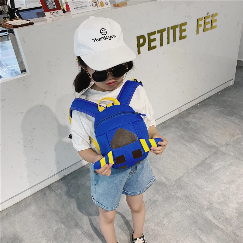 

1 Baby Backpacks New fashion backpack listed Cartoon Clock Print Plush Toys Bag PU Wallet