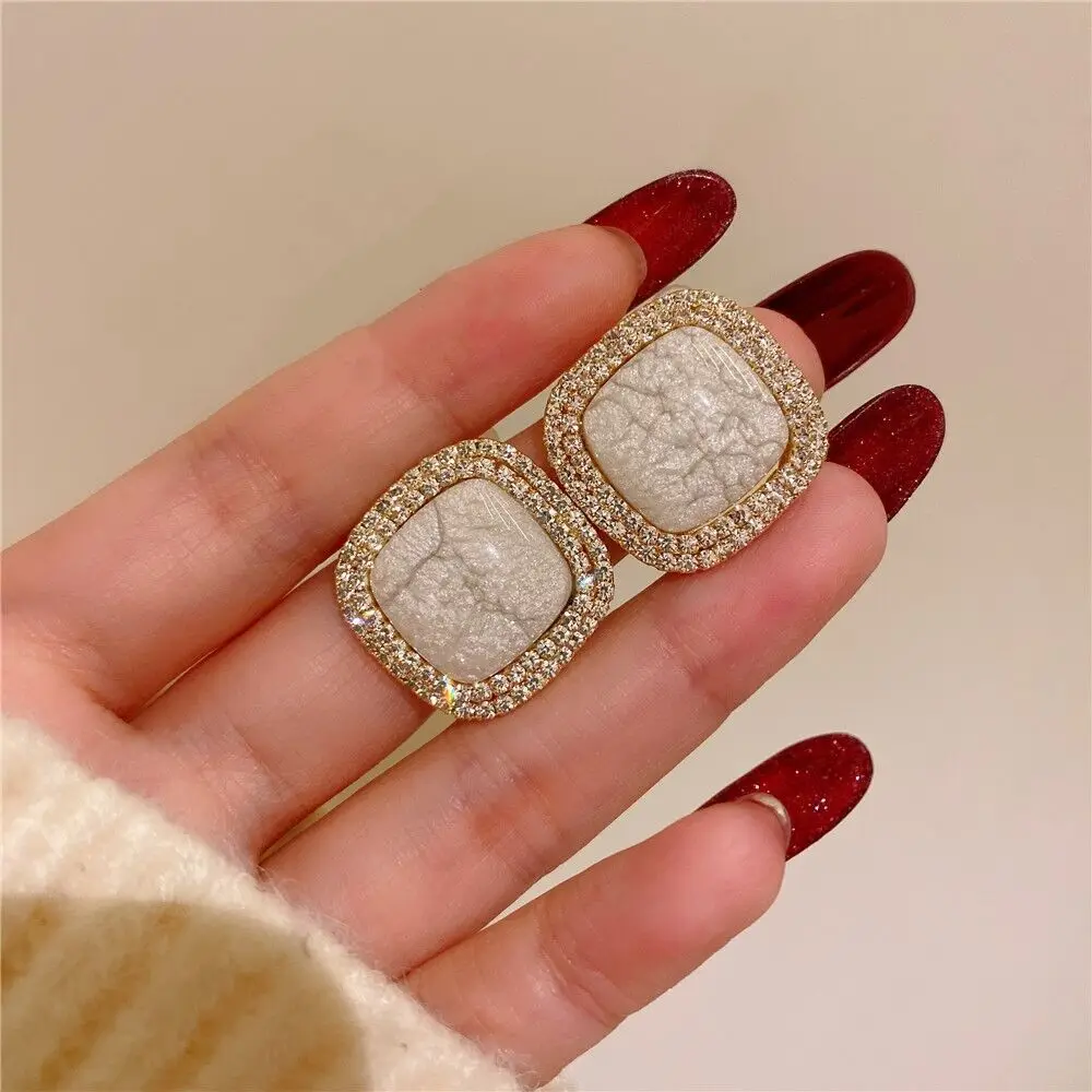 

Round rhinestone earrings 2022 new black fashion Korean personality temperament wild simple earrings ladies jewelry