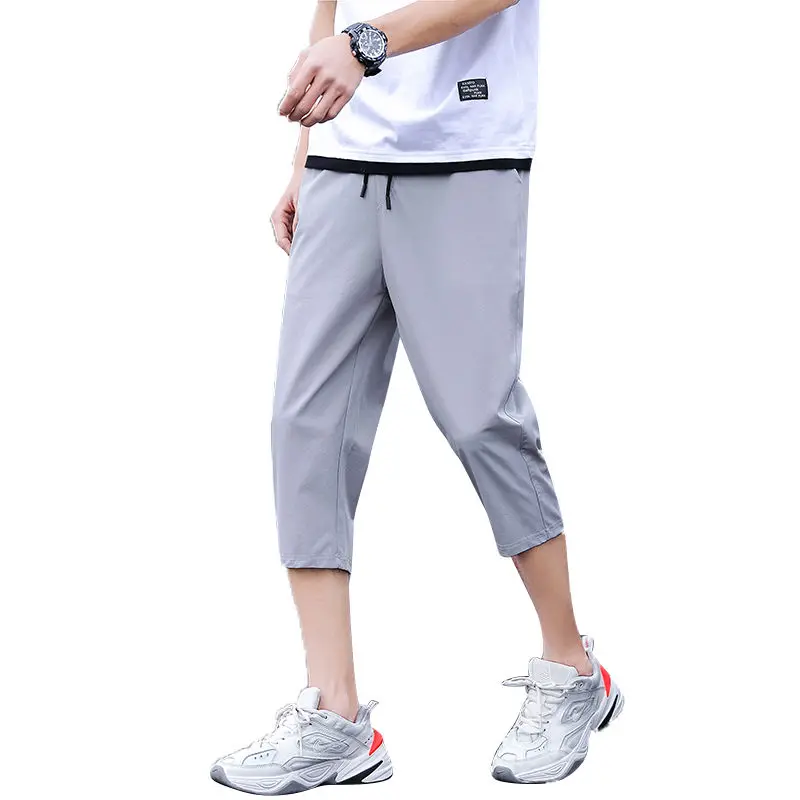 

Summer ice silk elastic Capris men's Korean fashion thin breathable breeches Capris casual quick drying sports pantsa NINIBEIBEI