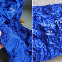 pleated crepe tulle fabric blue miyake styled folds diy stage wedding decor skirt dress fashion clothes designer fabric