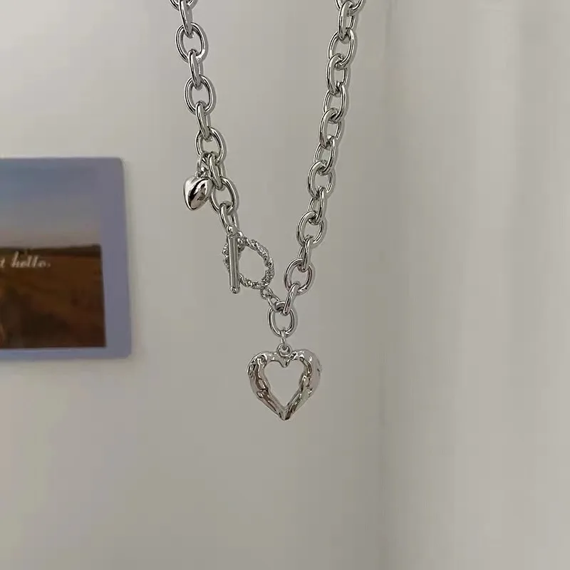 

Оптовая продажа, дизайнерское Латунное ожерелье в форме сердца с полыми фигурами в стиле хип-хоп, Высокопрочное посеребренное колье-чокер н...
