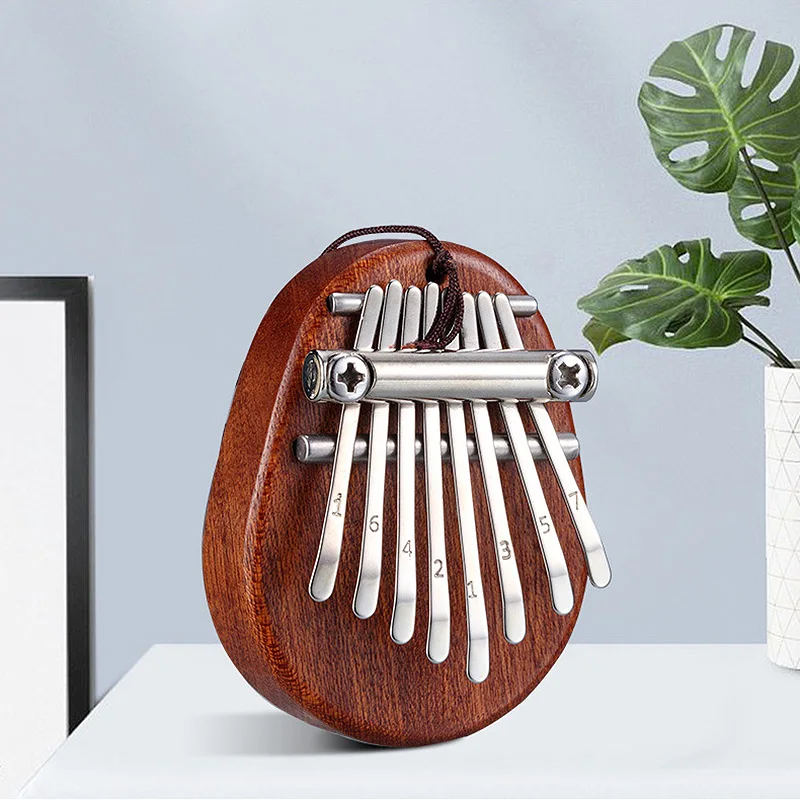 

8 Key Mini Kalimba Exquisite Finger Thumb Piano Marimba Musical Good Accessory Pendant Gift