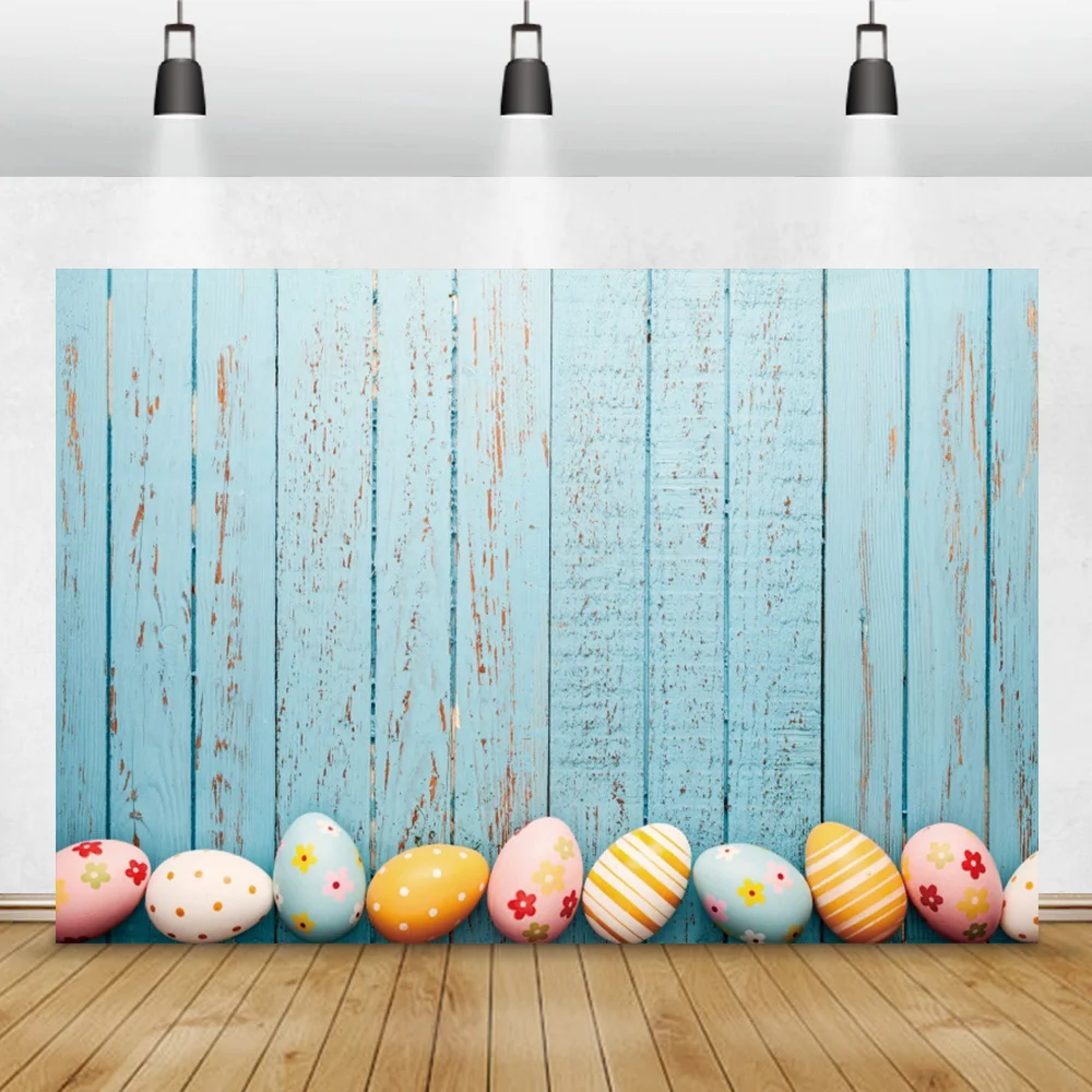 

Фон для фотосъемки с голубыми деревянными досками и пасхальными яйцами