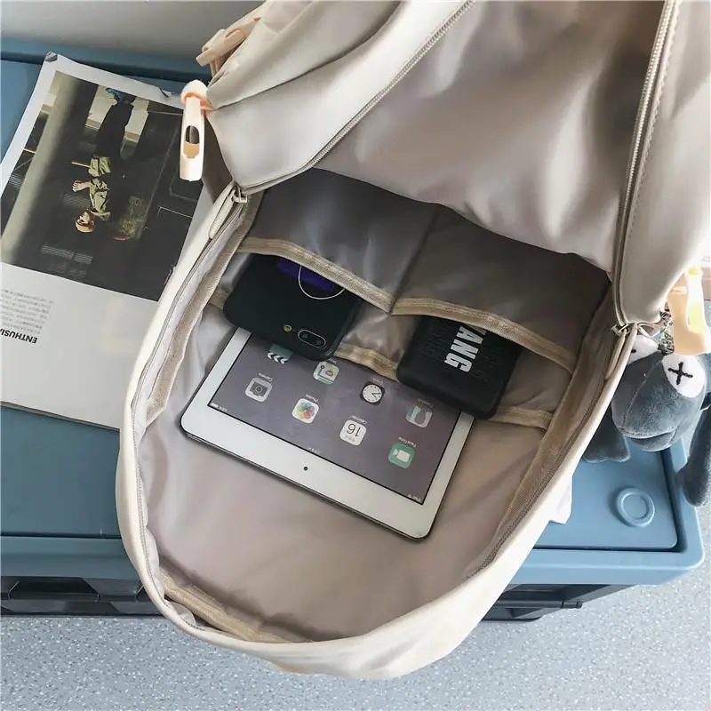 

2021 Large Capacity Solid Color Waterproof Nylon Backpack Unisex Multi-pocket Travel Bag College Schoolbags for Men and Women