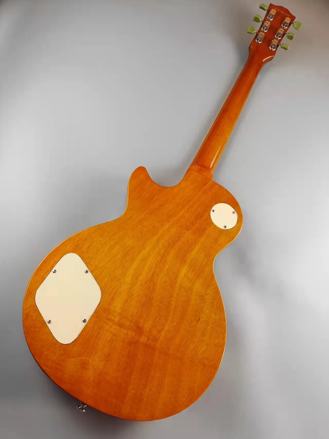 Электрическая гитара золотой блеск корпус из красного дерева фингерборд